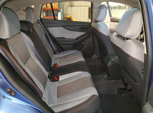 JF2GTACC1KH319902 2019 SUBARU CROSSTREK Blue Vista interior trasera