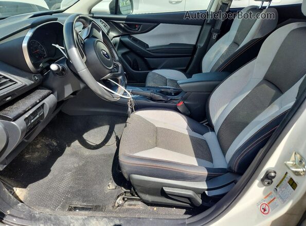 JF2GTACC6K8332614 2019 SUBARU CROSSTREK White Front interior view