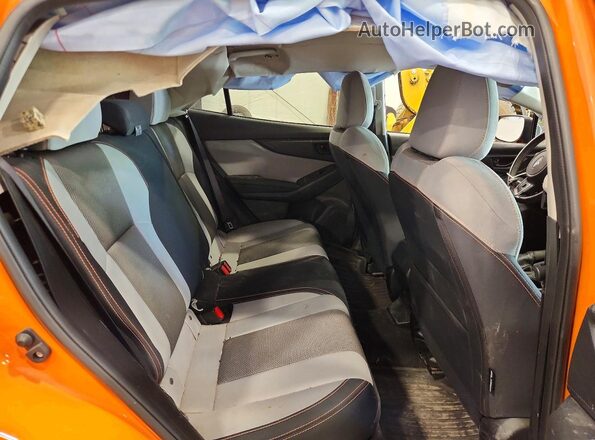 JF2GTACC6K8341099 2019 SUBARU CROSSTREK Orange Vista interior trasera