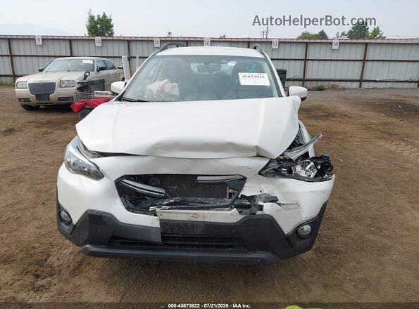 JF2GTACC8N9218709 2022 SUBARU CROSSTREK White Vista interior trasera