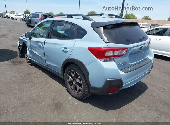 JF2GTADC4JH313749 2018 SUBARU CROSSTREK Light Blue Trasero izquierdo