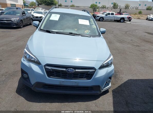 JF2GTADC4JH313749 2018 SUBARU CROSSTREK Light Blue Vista interior trasera