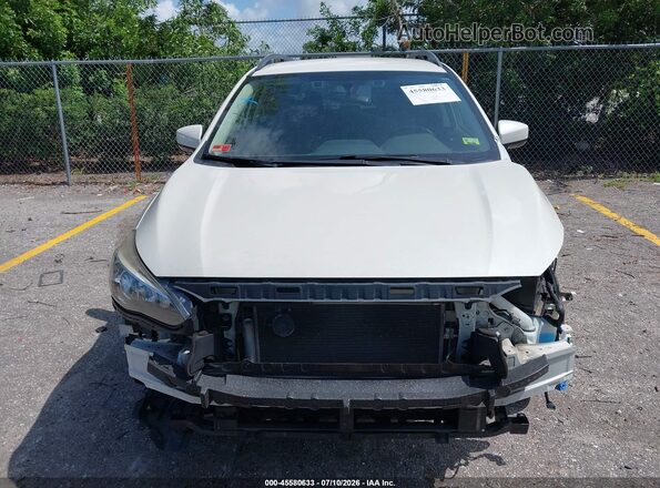 JF2GTADC8JH250834 2018 SUBARU CROSSTREK White Սալոնի հետևի տեսք