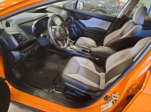 JF2GTADC9J8279260 2018 SUBARU CROSSTREK Orange Front interior view