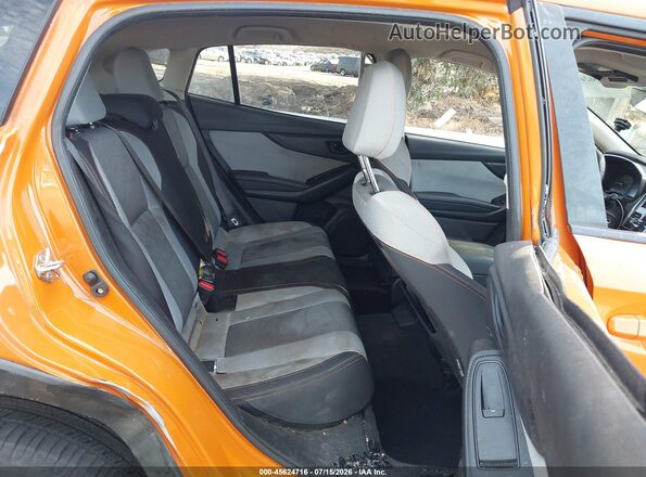 JF2GTADC9JH234481 2018 SUBARU CROSSTREK Orange Vista de la etiqueta del VIN