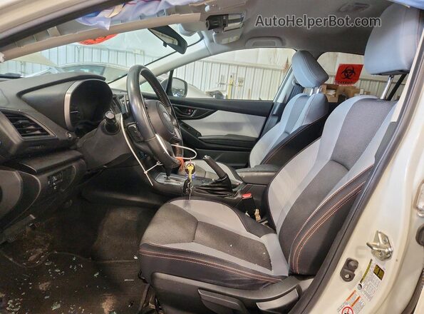 JF2GTAEC0K8301033 2019 SUBARU CROSSTREK White Vista interior delantera