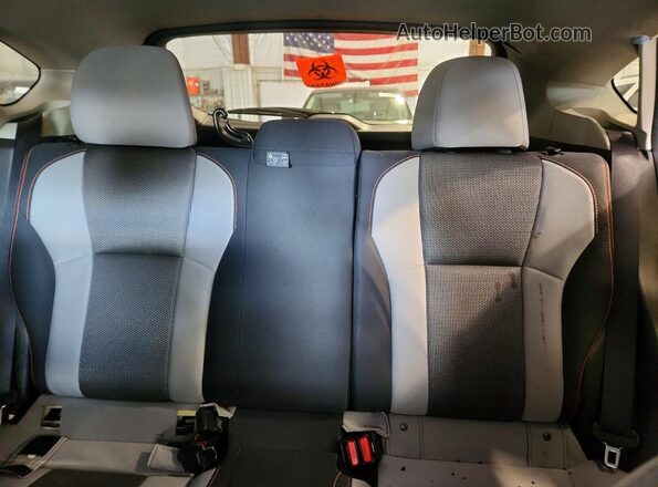 JF2GTAEC0K8301033 2019 SUBARU CROSSTREK White Vista de los asientos traseros