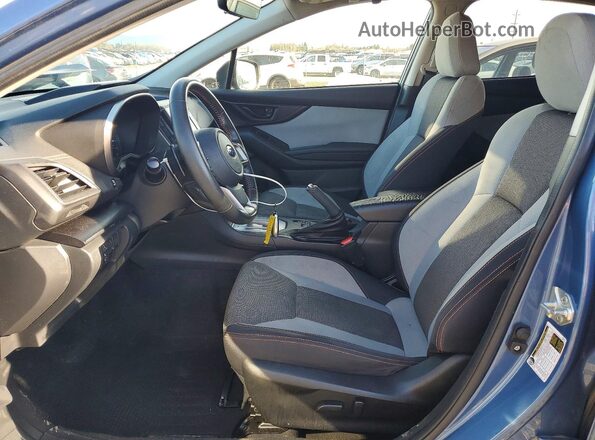 JF2GTAEC0MH302931 2021 SUBARU CROSSTREK Blue Widok wnętrza z przodu