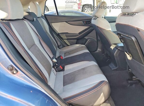 JF2GTAEC0MH302931 2021 SUBARU CROSSTREK Blue Widok wnętrza z tyłu