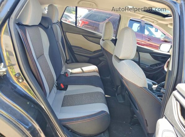 JF2GTAEC6KH206444 2019 SUBARU CROSSTREK Charcoal Vista interior trasera