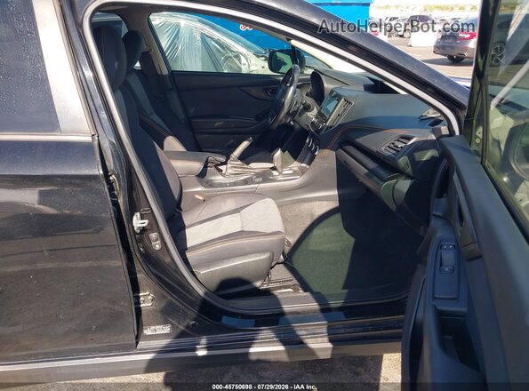 JF2GTAEC6M8334282 2021 SUBARU CROSSTREK Black Front interior view