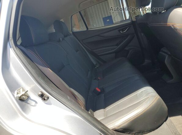 JF2GTAJC1JH313843 2018 SUBARU CROSSTREK Gray Rear interior view