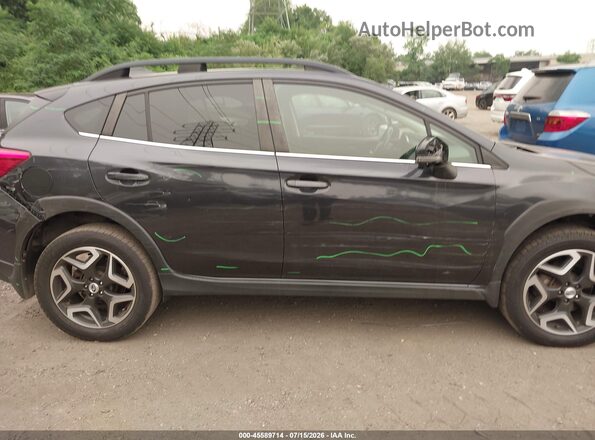 JF2GTALC9J8277915 2018 SUBARU CROSSTREK Black Rear interior view