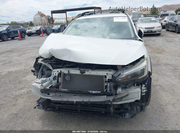 JF2GTALC9JH205368 2018 SUBARU CROSSTREK White Սալոնի հետևի տեսք