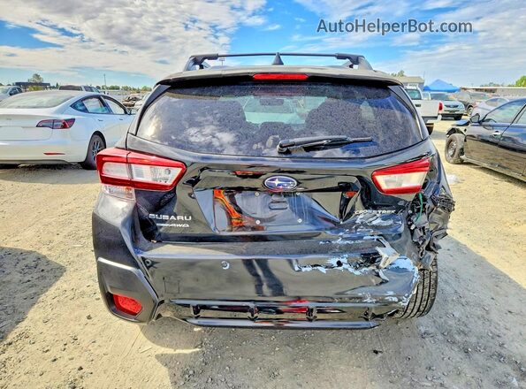 JF2GTAMC1JH302143 2018 SUBARU CROSSTREK Black Vista trasera