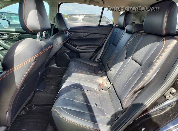 JF2GTAMC1JH302143 2018 SUBARU CROSSTREK Black Vista de los asientos traseros
