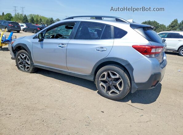JF2GTAMC5K8260285 2019 SUBARU CROSSTREK Silver Trasero izquierdo