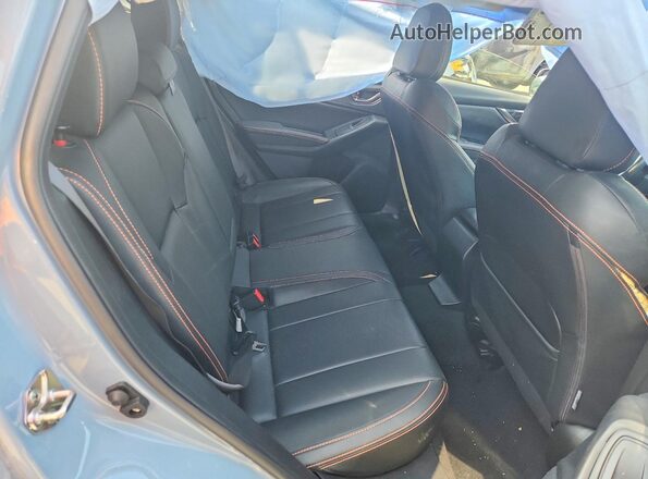 JF2GTANC0KH202499 2019 SUBARU CROSSTREK Blue Vista interior trasera