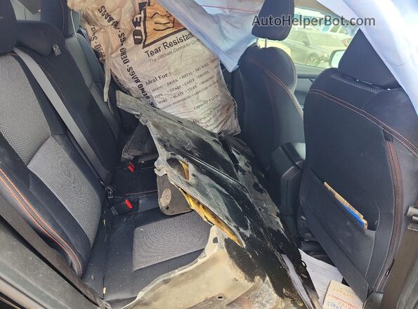 JF2GTAPC0M8207556 2021 SUBARU CROSSTREK Black Rear interior view