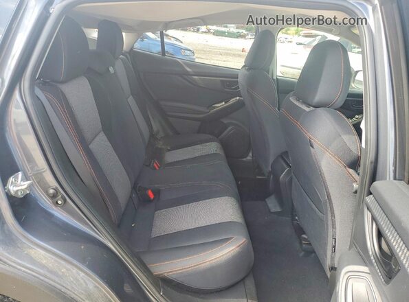 JF2GTAPC2P8280836 2023 SUBARU CROSSTREK Charcoal Rear interior view