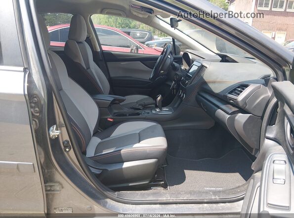 JF2GTAPC3M8677905 2021 SUBARU CROSSTREK Green Front interior view
