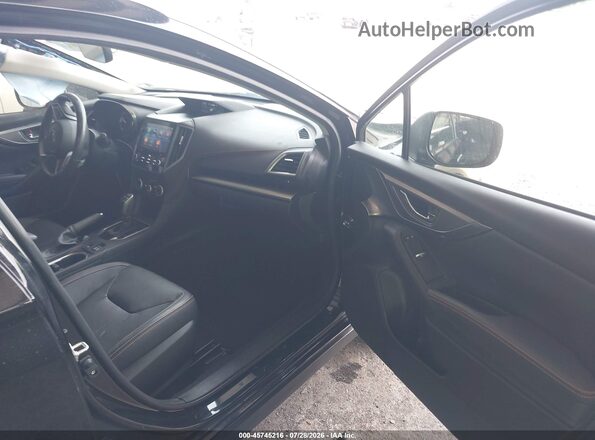 JF2GTHMC4M8250617 2021 SUBARU CROSSTREK Black Front interior view