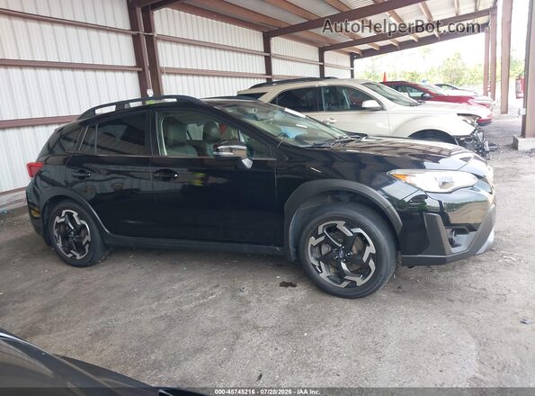 JF2GTHMC4M8250617 2021 SUBARU CROSSTREK Black Rear interior view