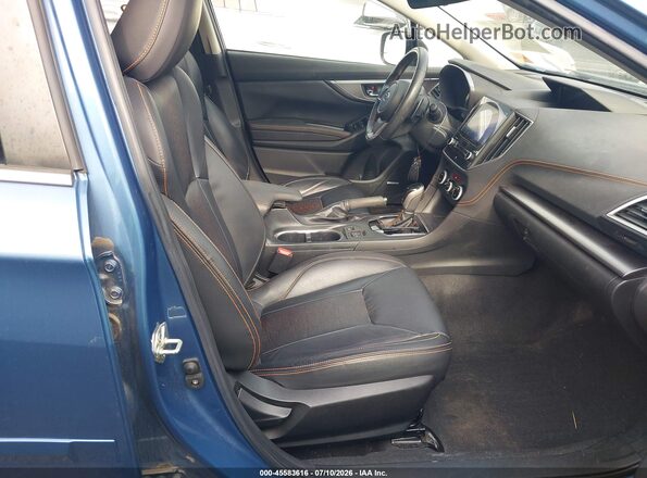 JF2GTHNC8MH346541 2021 SUBARU CROSSTREK Blue Widok wnętrza z przodu