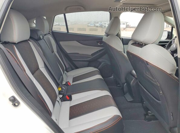 JF2GTHNC8PH305086 2023 SUBARU CROSSTREK White Vista interior trasera