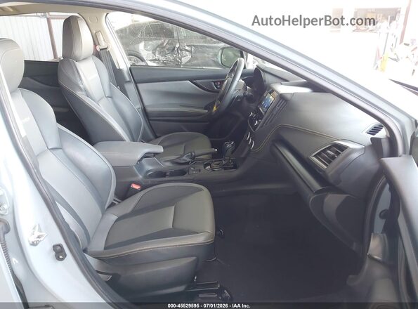JF2GTHRC1MH322821 2021 SUBARU CROSSTREK Light Blue Front interior view