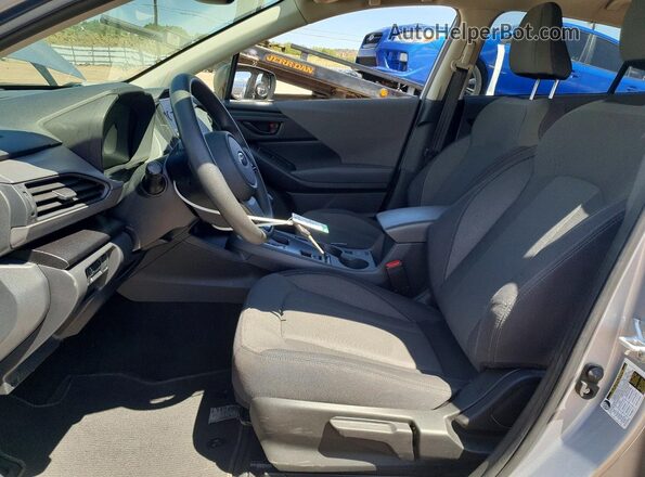 JF2GUABC6R8871369 2024 SUBARU CROSSTREK Silver Vista interior delantera