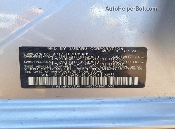 JF2GUABC6R8871369 2024 SUBARU CROSSTREK Silver Vista del compartimento del motor