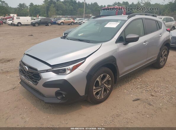 JF2GUADC3R8238714 2024 SUBARU CROSSTREK Silver Vista tres cuartos delantera izquierda