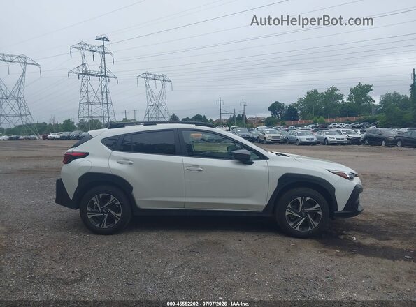 JF2GUHDC8SH303555 2025 SUBARU CROSSTREK White Vista interior trasera