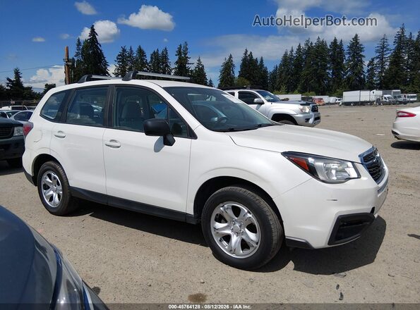 JF2SJAAC1JG424706 2018 SUBARU FORESTER White Вид задньої частини салону