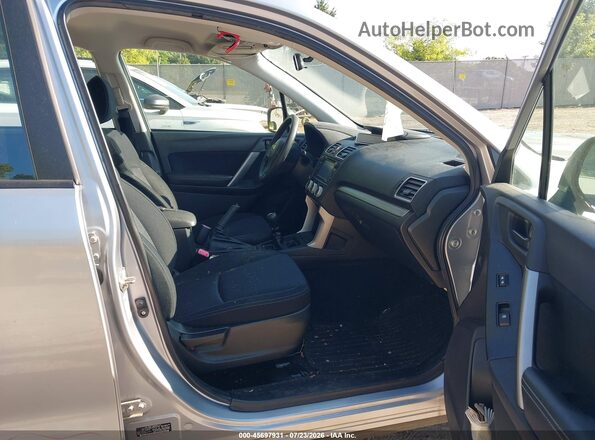 JF2SJAAC4GG429794 2016 SUBARU FORESTER Silver Front interior view