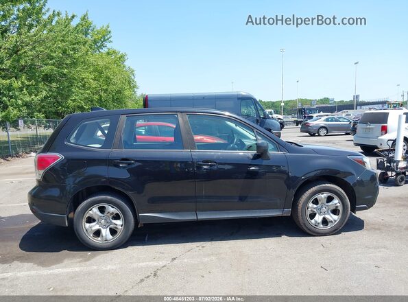 JF2SJAAC9HH517851 2017 SUBARU FORESTER Black Vista interior trasera