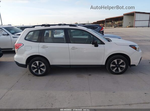 JF2SJABC0HH571537 2017 SUBARU FORESTER White Rear interior view