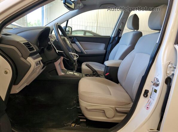 JF2SJABC1GH422911 2016 SUBARU FORESTER White Vista interior delantera