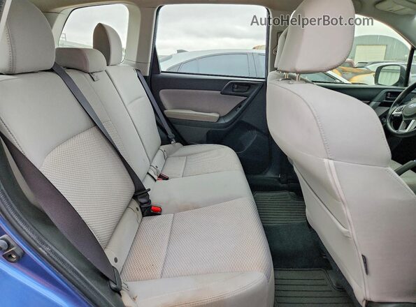 JF2SJABC6JH549550 2018 SUBARU FORESTER Blue Vista de los asientos traseros