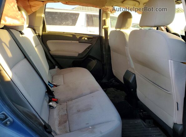JF2SJABC7JH570715 2018 SUBARU FORESTER Blue Rear interior view