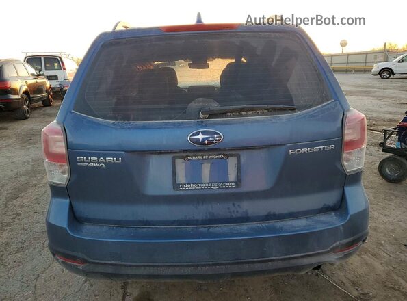 JF2SJABC7JH570715 2018 SUBARU FORESTER Blue Rear view