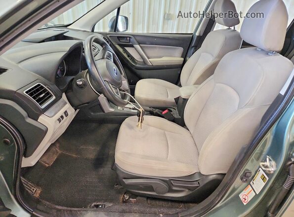 JF2SJABC9HH490990 2017 SUBARU FORESTER Green Widok wnętrza z przodu
