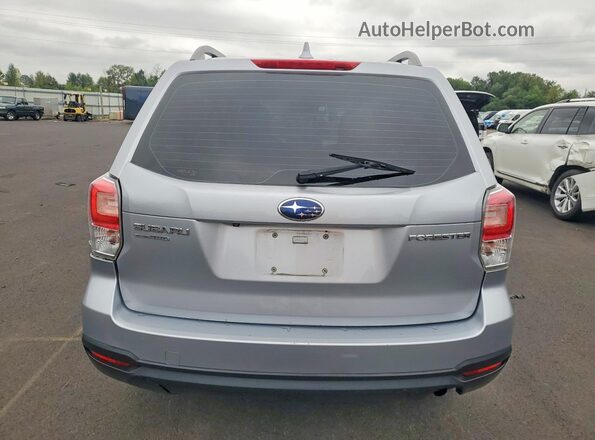 JF2SJABCXJH544397 2018 SUBARU FORESTER Silver Rear view