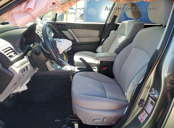 JF2SJADC0GH469313 2016 SUBARU FORESTER Зеленый Вид салона спереди