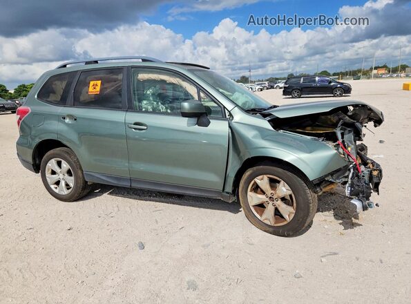JF2SJADC1GH400355 2016 SUBARU FORESTER Green Front right