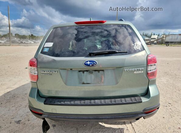 JF2SJADC1GH400355 2016 SUBARU FORESTER Green Rear view