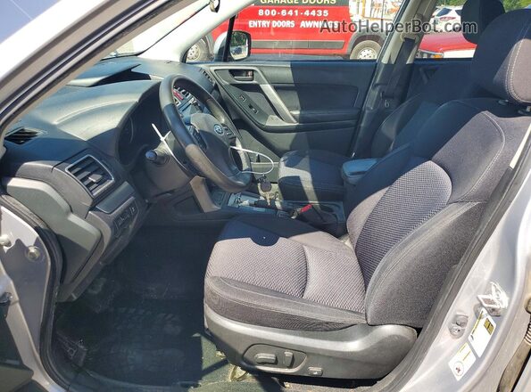 JF2SJADC2GH542553 2016 SUBARU FORESTER Silver Front interior view