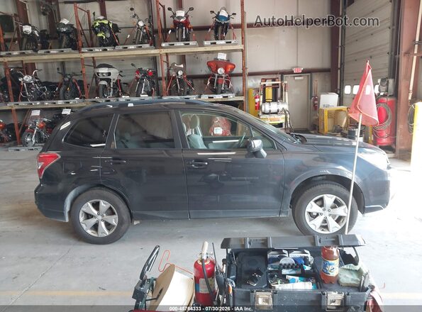 JF2SJADC3GH407744 2016 SUBARU FORESTER Черный Вид задней части салона