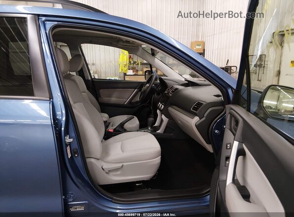 JF2SJADC3GH557868 2016 SUBARU FORESTER Синий Вид салона спереди